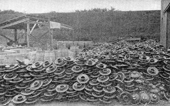 FIG. 2. � A PILE OF 20,000 INSULATORS WEIGHING 12 POUNDS EACH.
