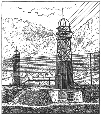 HIGH-TENSION LINES CROSSING A RAILWAY.