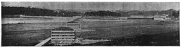 FIG. 12. � VIEW OF THE POWER HOUSE, SHOWING BOOM AND CRIB TO ARREST FLOATING REFUSE.